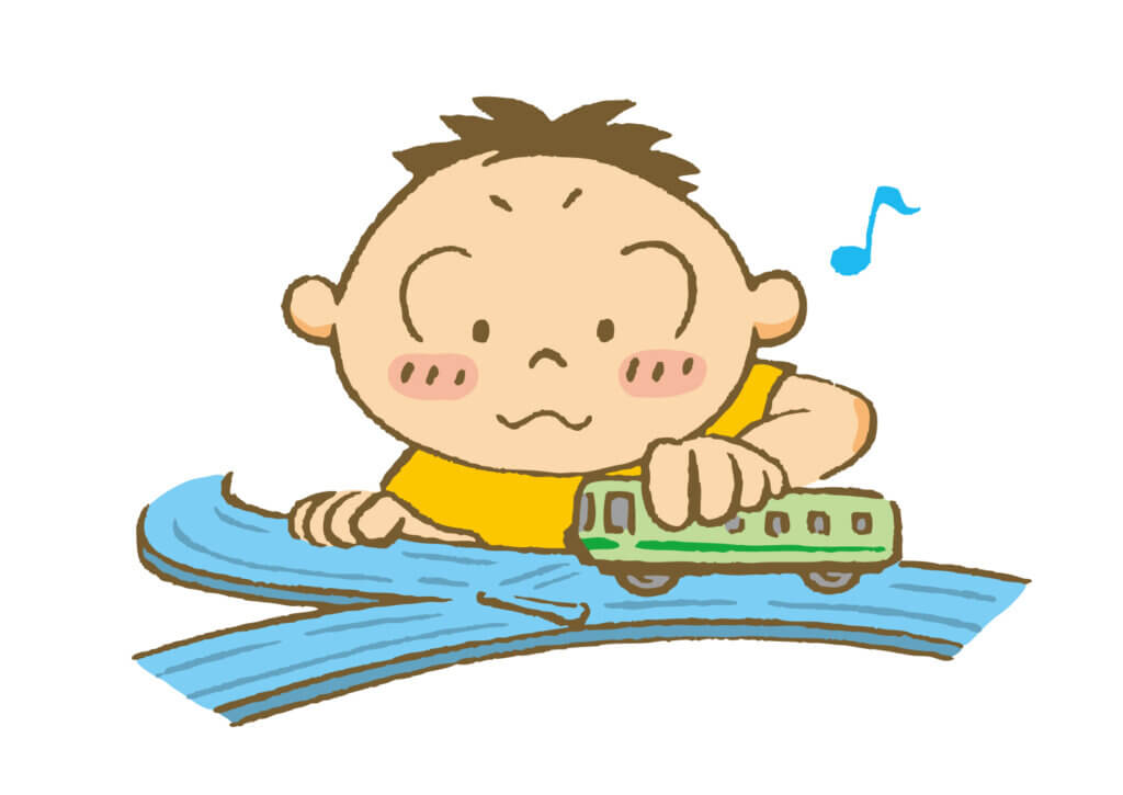 電車で遊ぶ男の子